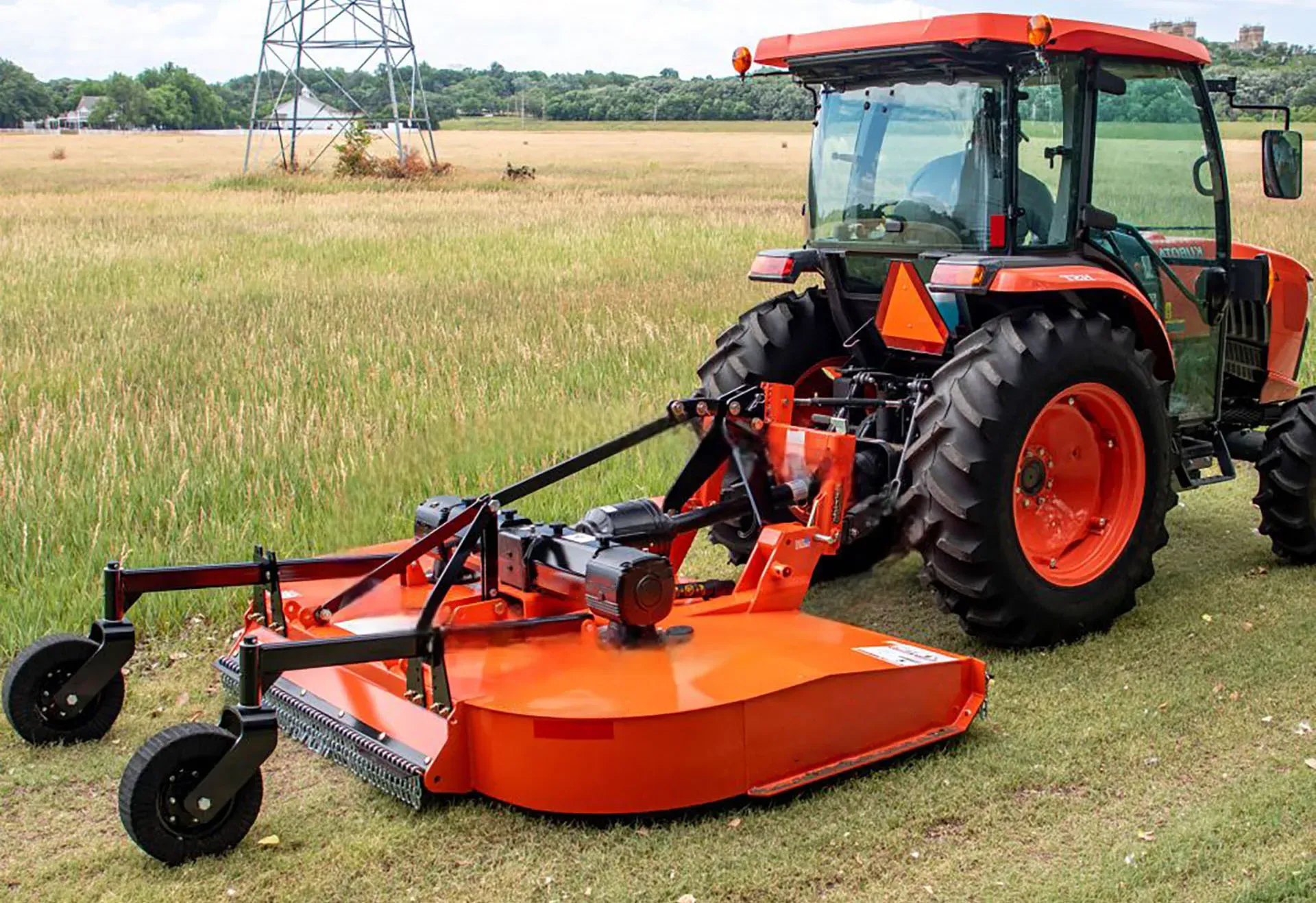 Rotary cutter gearbox in typical field usage scenario showing PTO connection and blade output